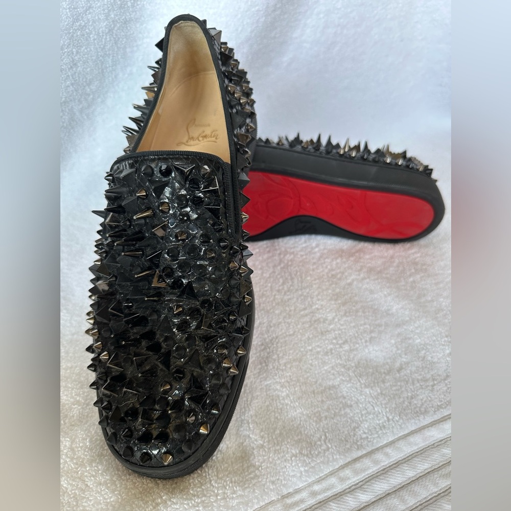 Christian Louboutin” Authenticated” Black Sneakers with Red Soles